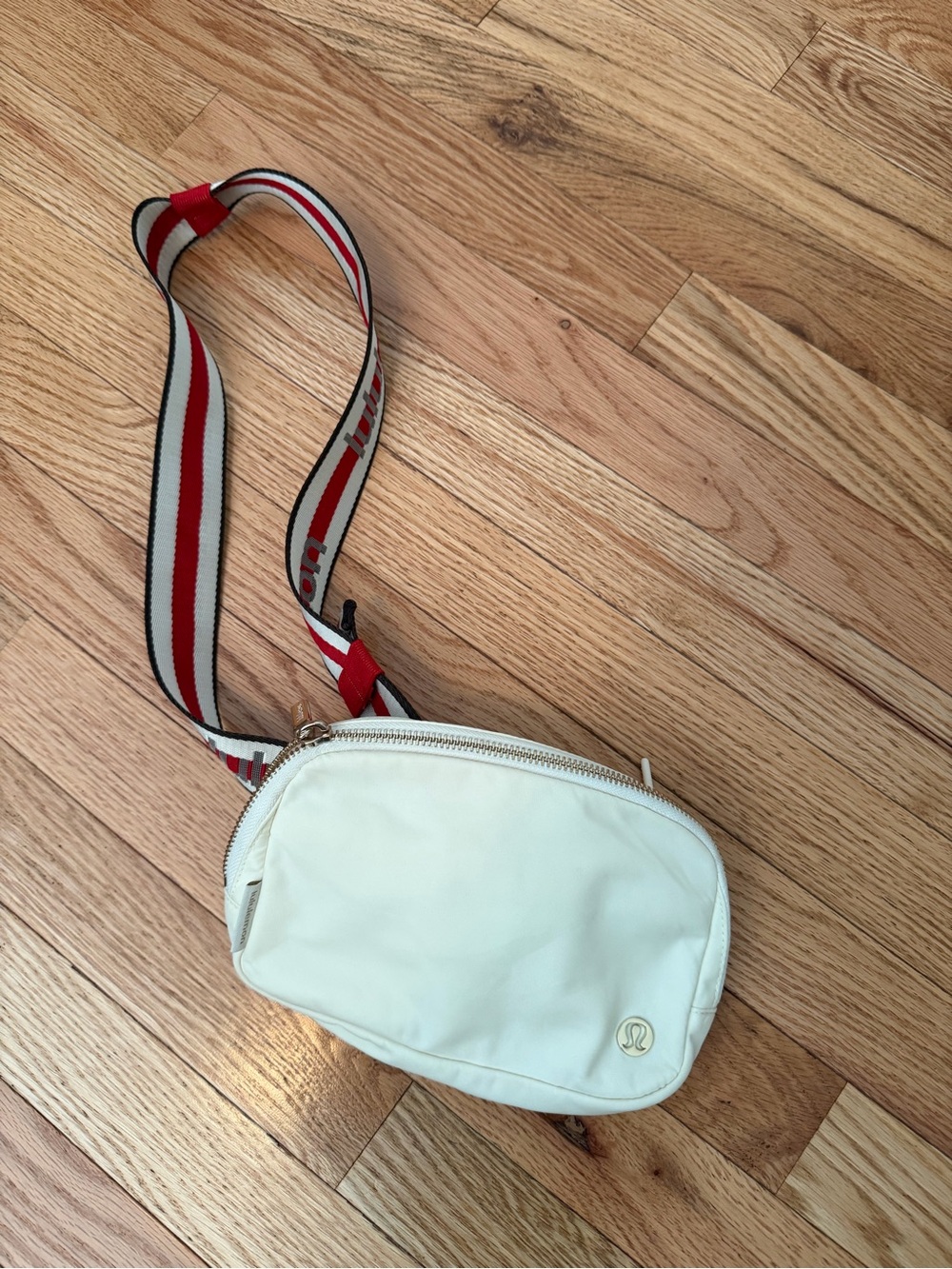 lululemon athletica Cream Crossbody Belt Bag with Red-Striped Strap